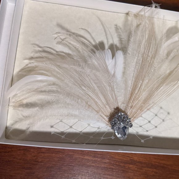 Feather hairpiece with jewel white & cream colored feathers